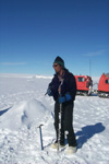 Instructor holding auger